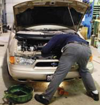 mechanic over hood